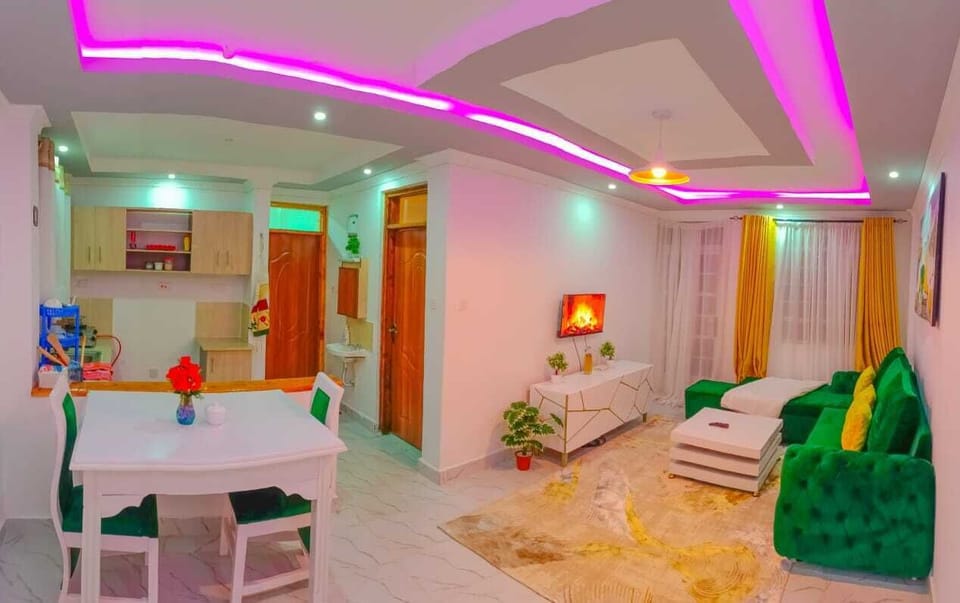 Business Apartment | Living area | 24-inch Smart TV with digital channels