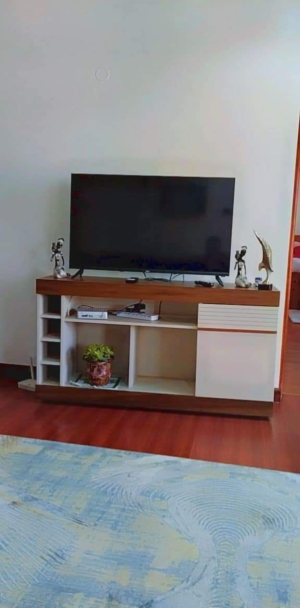 Business Apartment | Living area | 24-inch Smart TV with digital channels