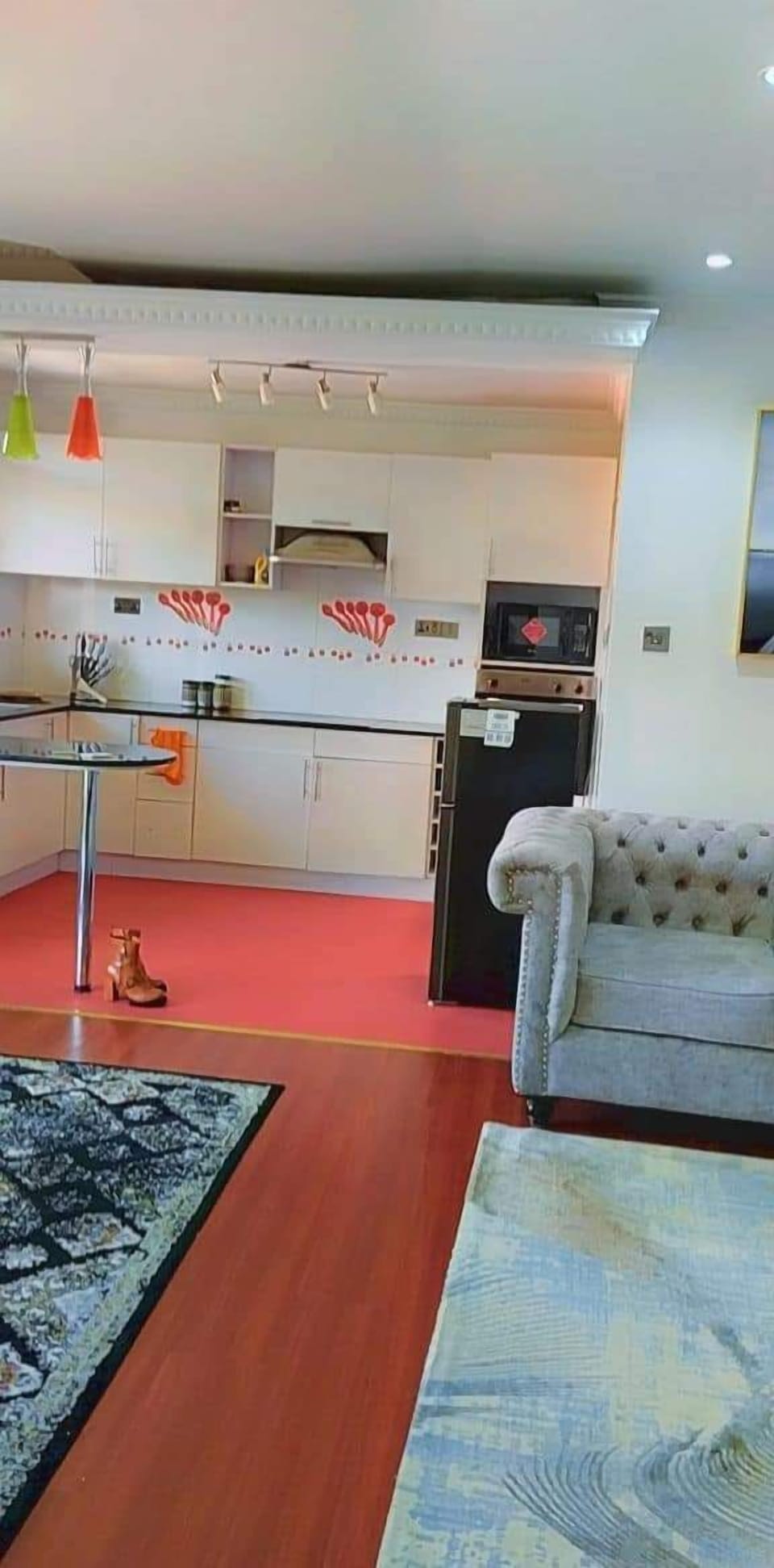 Business Apartment | Living area | 24-inch Smart TV with digital channels