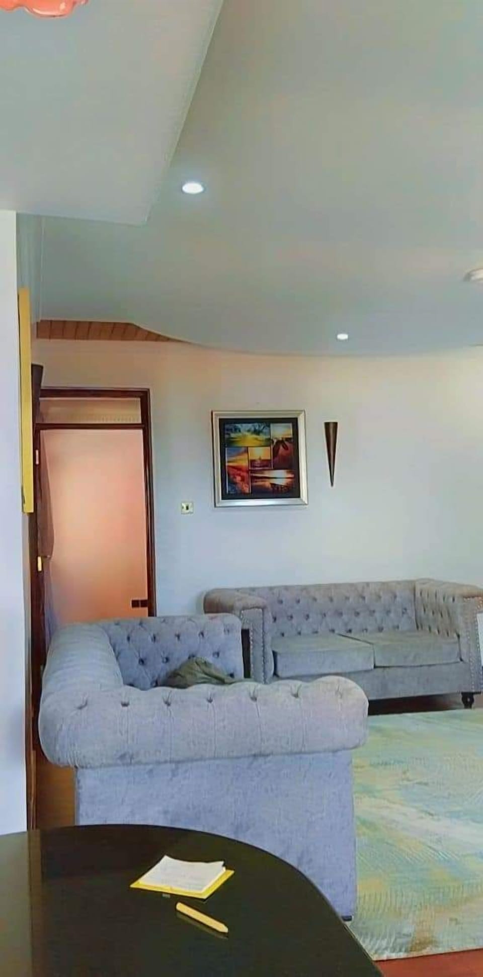 Business Apartment | Living area | 24-inch Smart TV with digital channels