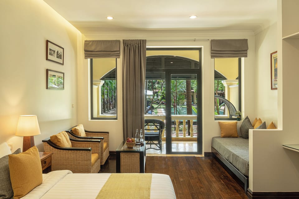 Deluxe Double with Pool View | Minibar, in-room safe, individually decorated, individually furnished
