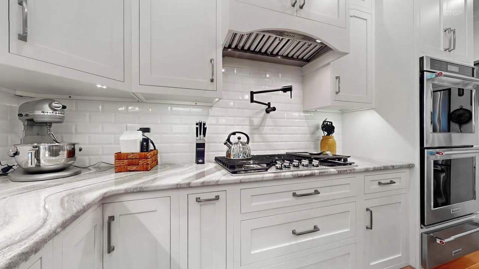 Pot filler above stove