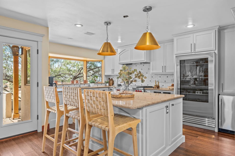 Chef kitchen- high end appliances, Wolf stove- bay windows and views!