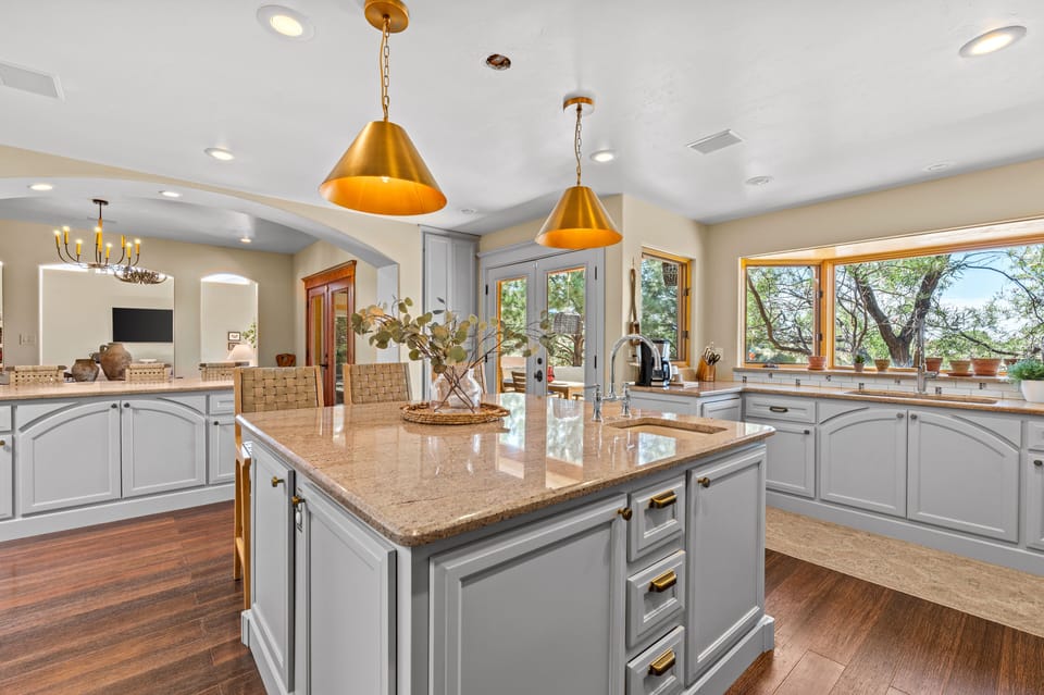 Gorgeous views- two kitchen islands/ ample seating, leads to porch deck