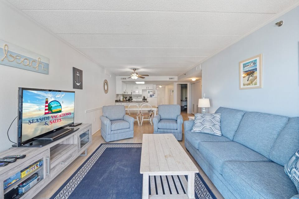 There is plenty of space in this open living room for the whole family to gather around for some board game action!