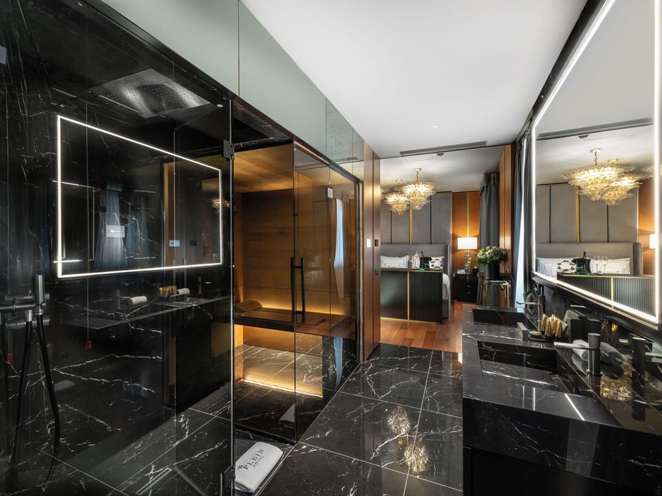 Spa Deluxe Room | Bathroom | Designer toiletries, hair dryer, bathrobes, slippers
