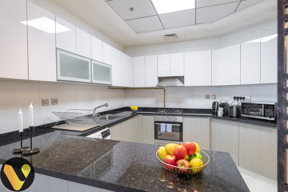 Luxury Apartment | Private kitchen | Full-size fridge, microwave, oven, stovetop