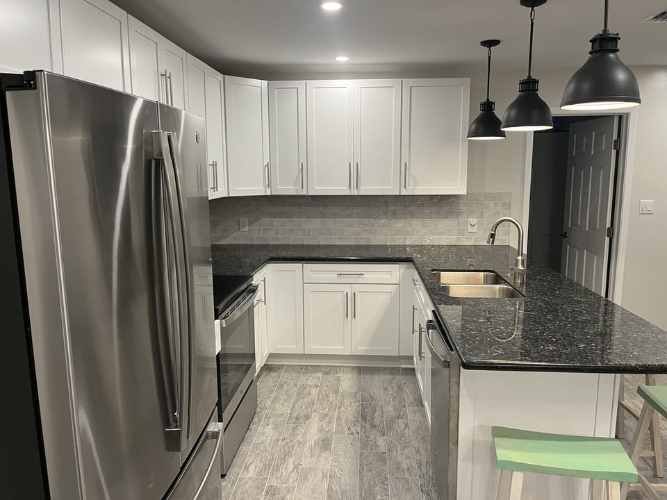 Kitchen area with breakfast bar peninsula