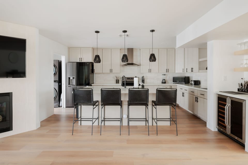Four kitchen island seats.