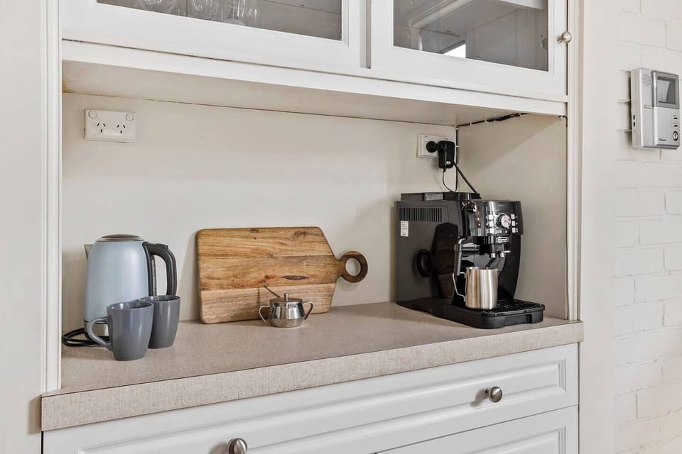 Conveniently prepare meals and enjoy the use of the coffee machine, kettle, and toaster.