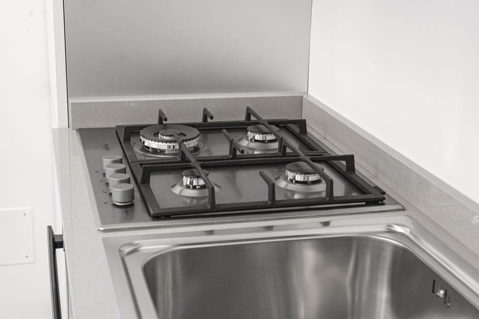 Classic Apartment | Private kitchenette | Full-size fridge, microwave, stovetop, dishwasher