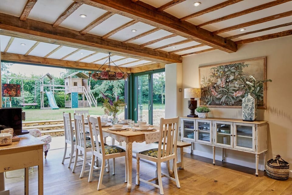 The dining area enjoys the view over the play area and the rear garden