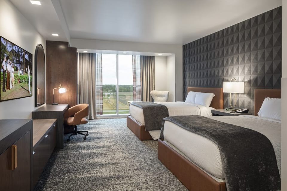 Hypo-allergenic bedding, in-room safe, desk, laptop workspace