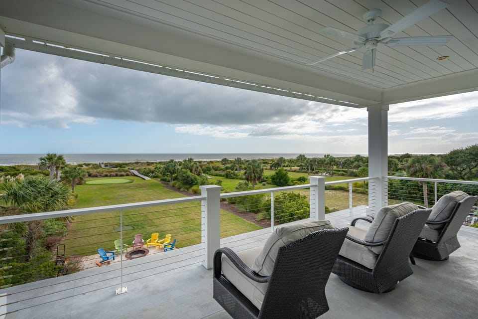 Spend your days lounging by the pool or 3 levels of decks overlooking the beach.