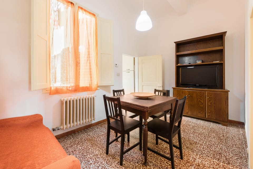 Basic Apartment | Living area | 40-inch flat-screen TV with digital channels