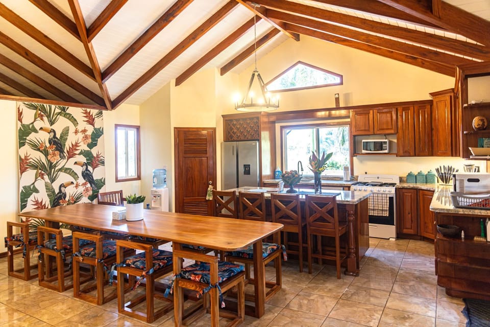 Natural light from four directions streaming into the kitchen.  Granite counters