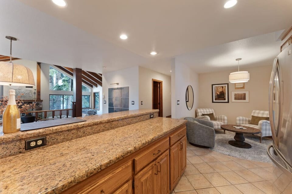 Cozy nook with stylish seating, perfect for relaxing near the kitchen and dining area!