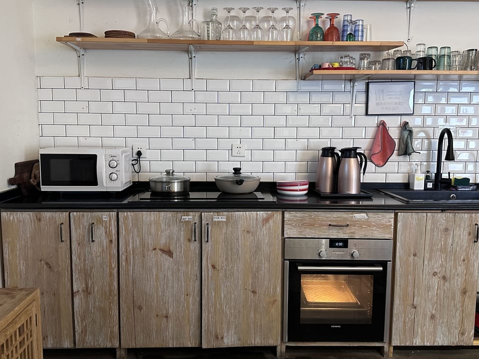 City House | Private kitchenette | Coffee/tea maker, full-size fridge, microwave, oven