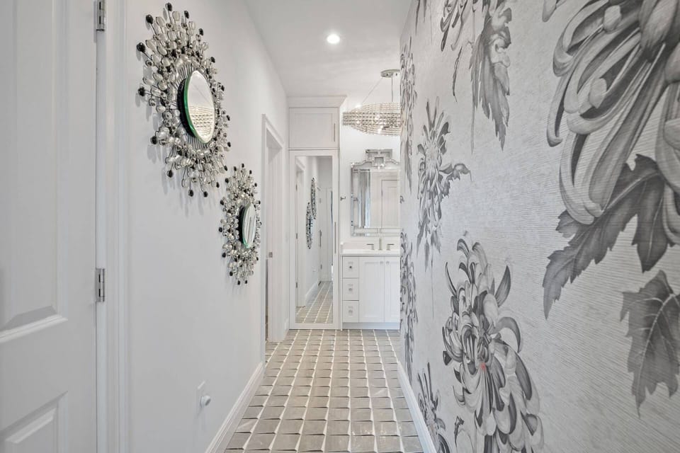 Master Bedroom ~ Spacious with Lavish Decorative Tile & Decor throughout the Bathroom & Closets