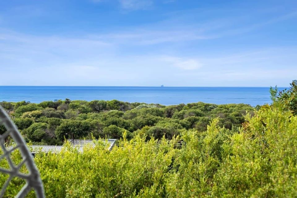 The extensive windows frame the grandeur of the ocean with captivating 180-degree views over Bass Strait