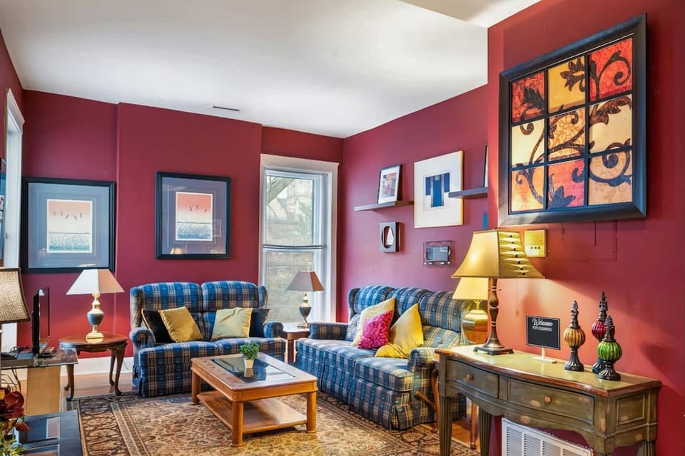 Living room with smart TV, design details and a warm, collected feel