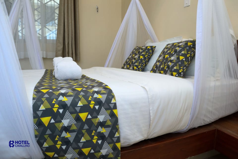 Desk, laptop workspace, free WiFi, bed sheets
