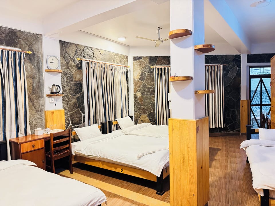 Quadruple Room | Memory foam beds, in-room safe, individually decorated, blackout drapes