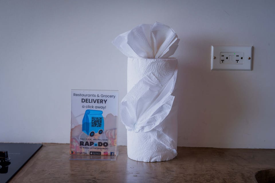 Thoughtful guest touches, including fresh towels and local service information.
