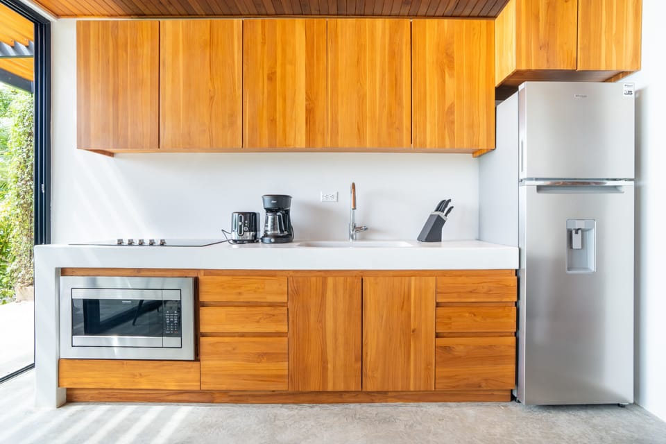 A sleek, functional kitchen designed to make vacation living simple and comfortable.
