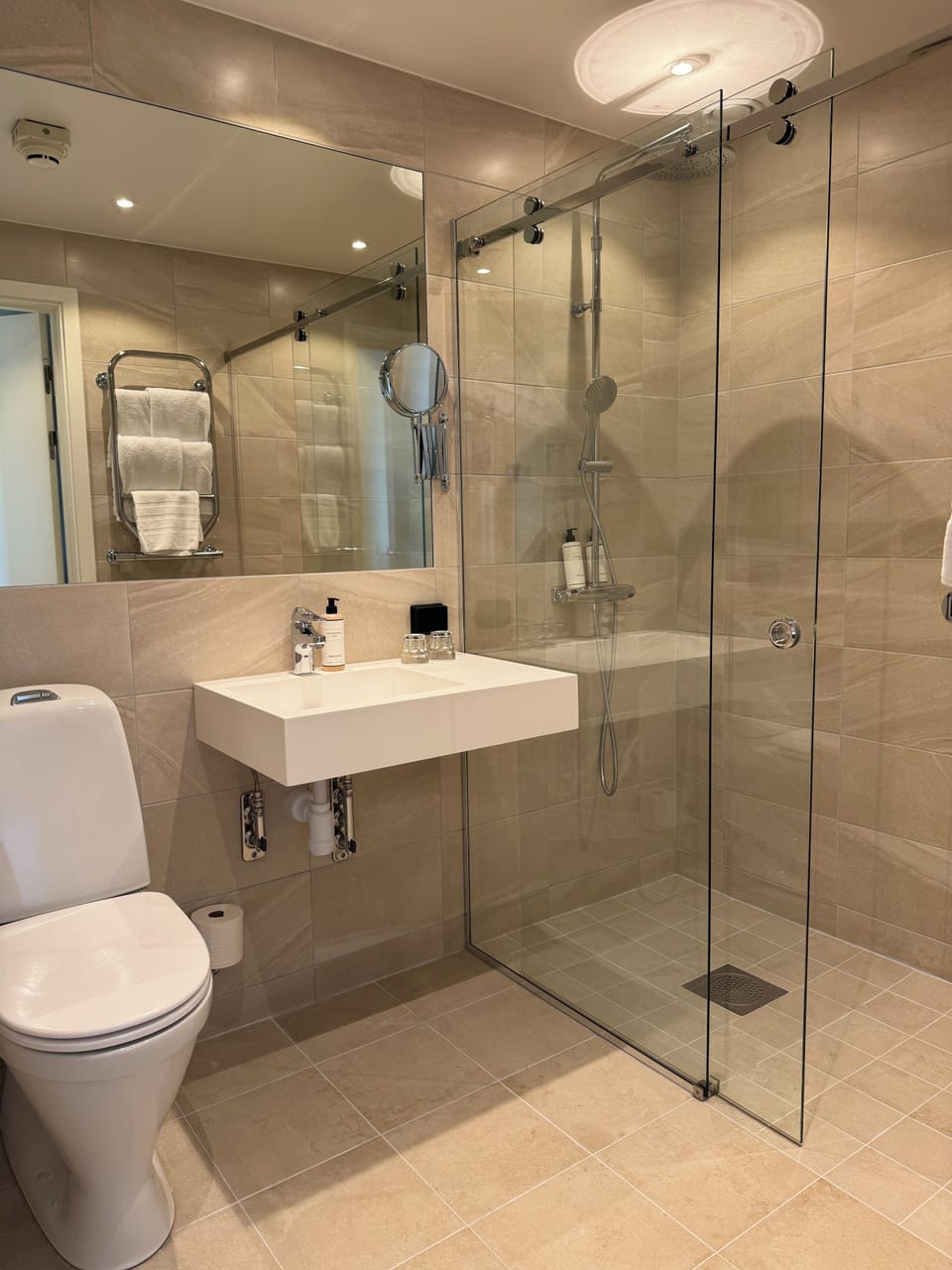 Shower, eco-friendly toiletries, hair dryer, heated floors