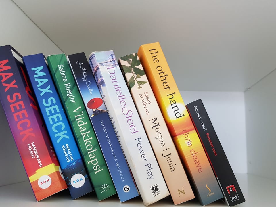 There is a small bookshelf. Bring your old book and take a new story to read.