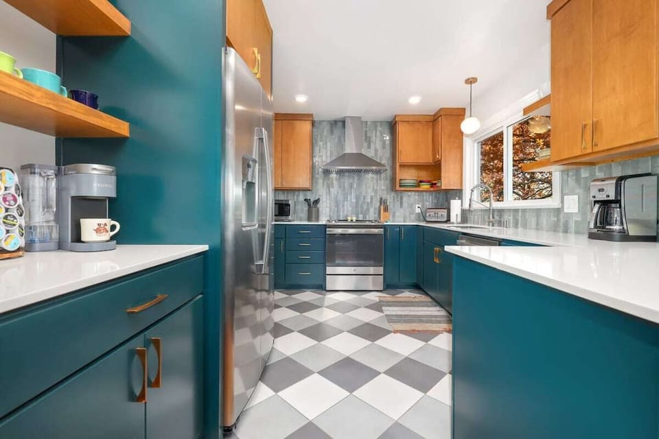 We love the color and openness of this kitchen!