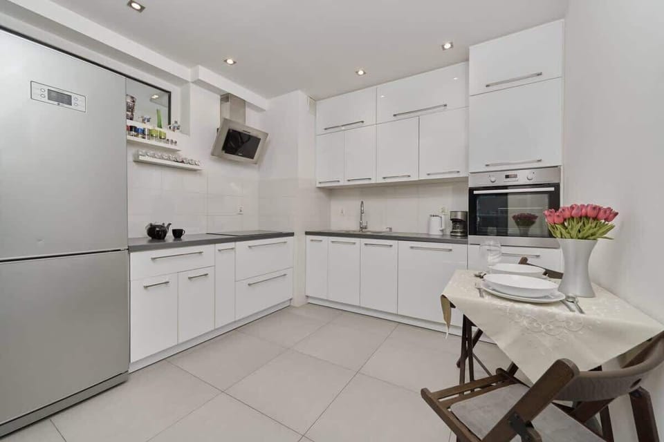 Separate kitchen with dining table