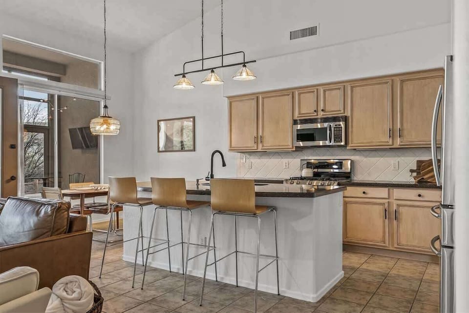 Modern kitchen with bar seating for 3