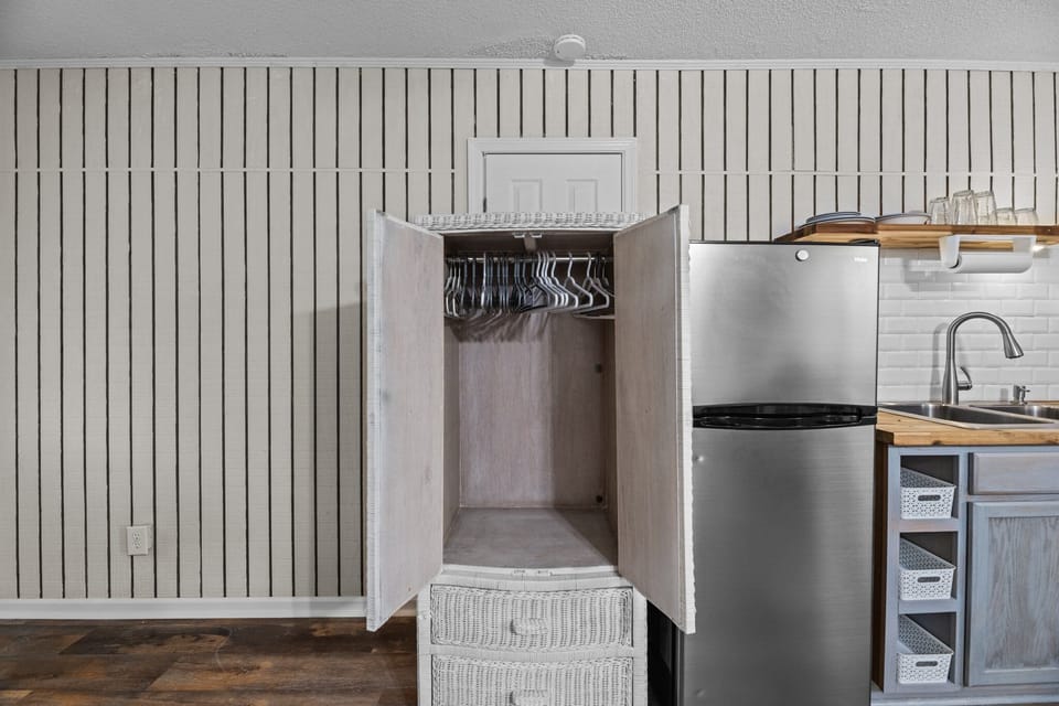 Space-saving solution: Armoire for hanging clothes.
