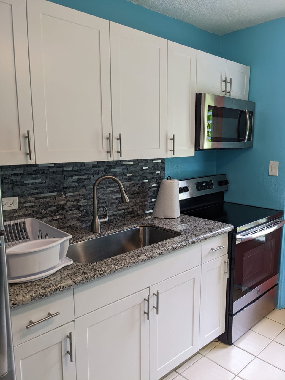 kitchen area with full sized appliances 