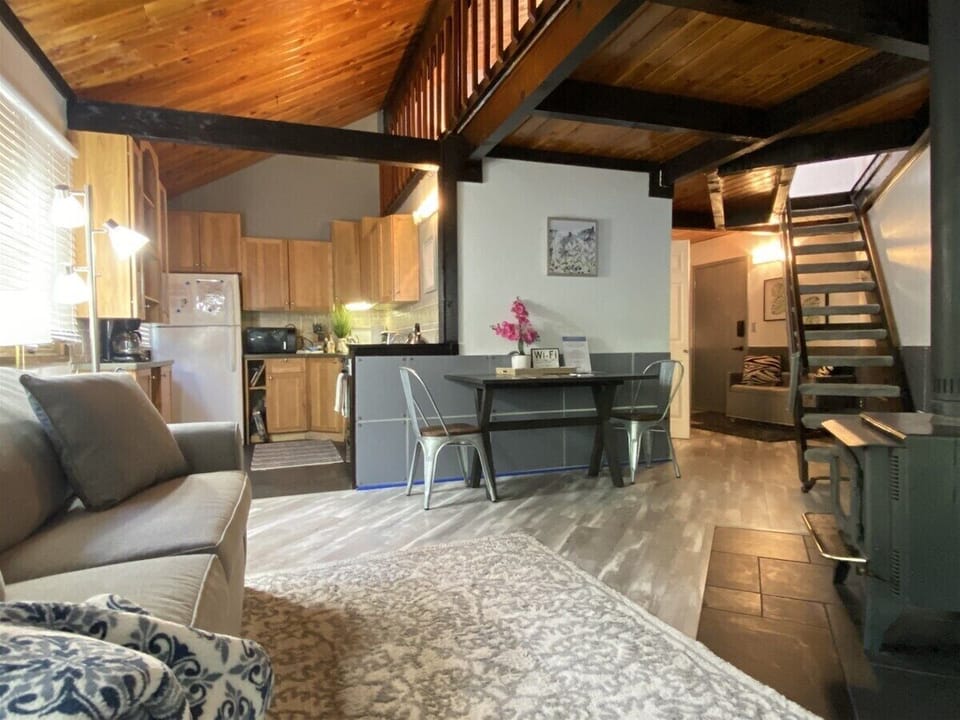 Cozy living area with a wood burning stove