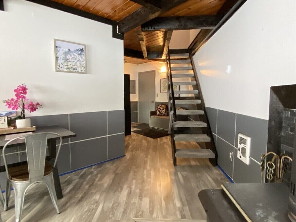 View going to the stairs to the loft from the living room