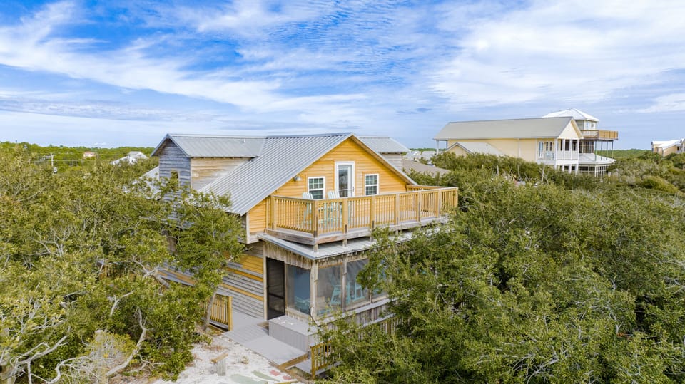 Tree Tops is a multi-level home that will sleep 13 guests