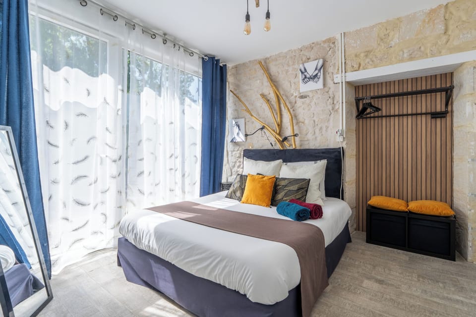 La Tribu | Individually decorated, individually furnished, blackout drapes