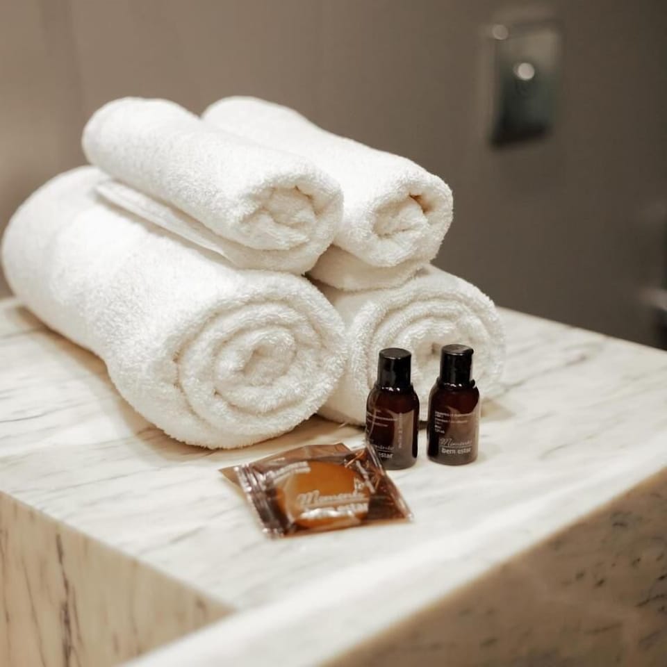 King size bed room with pool view | Bathroom | Hair dryer, towels, soap, shampoo