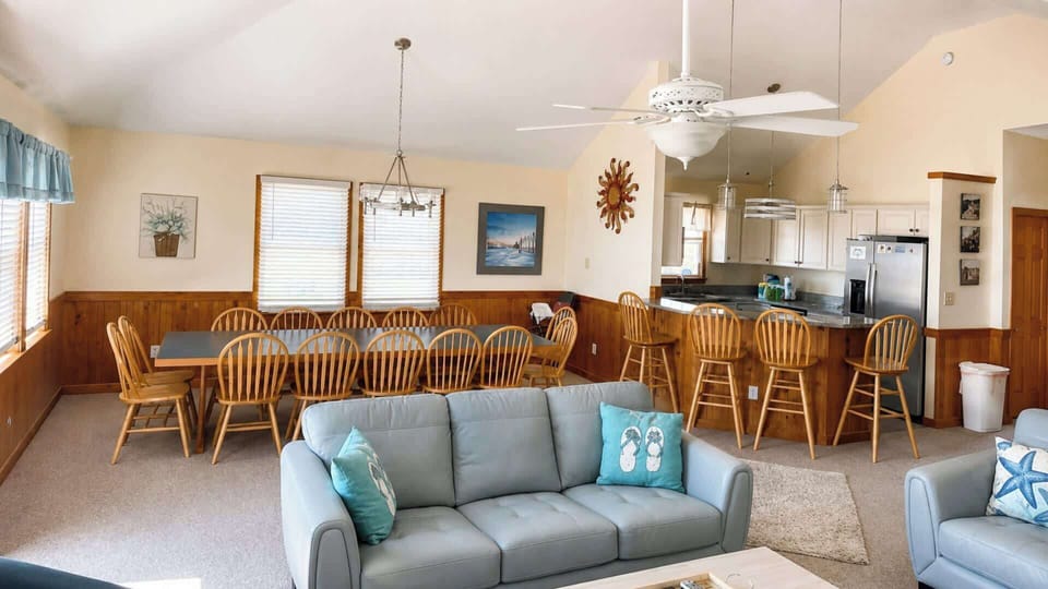 The vaulted great room and its natural light.