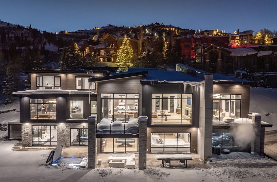 Jaw dropping floor to ceiling windows grace nearly every space in this home. 