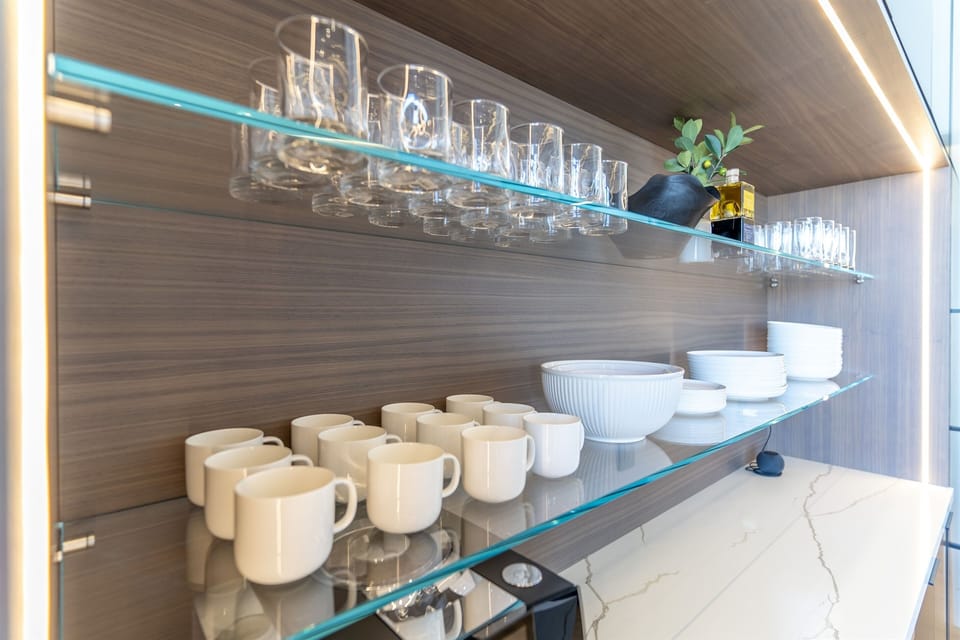 Glass shelving in main kitchen. 