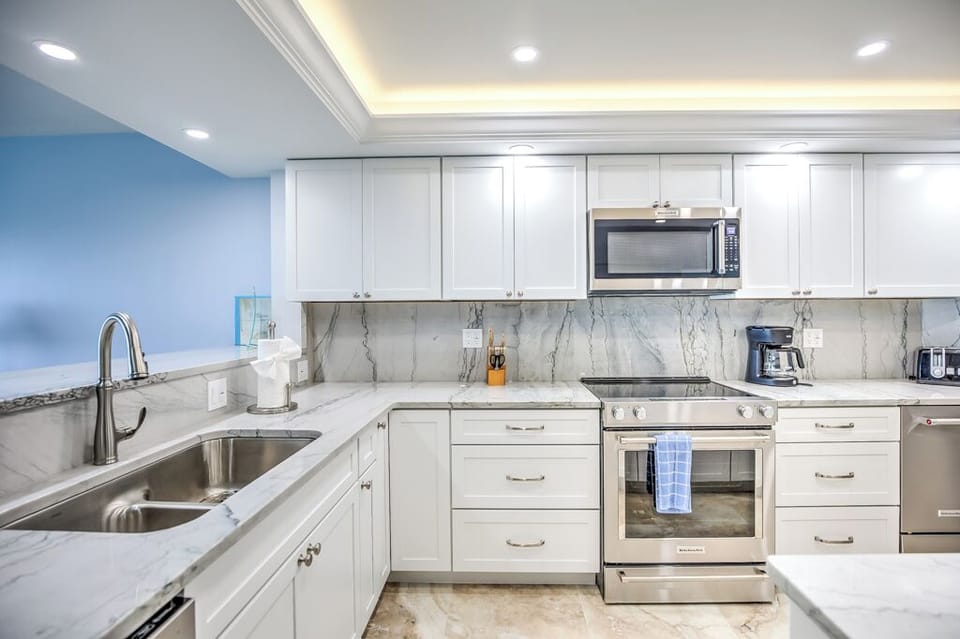 Upgraded kitchen with high end appliances and custom countertops