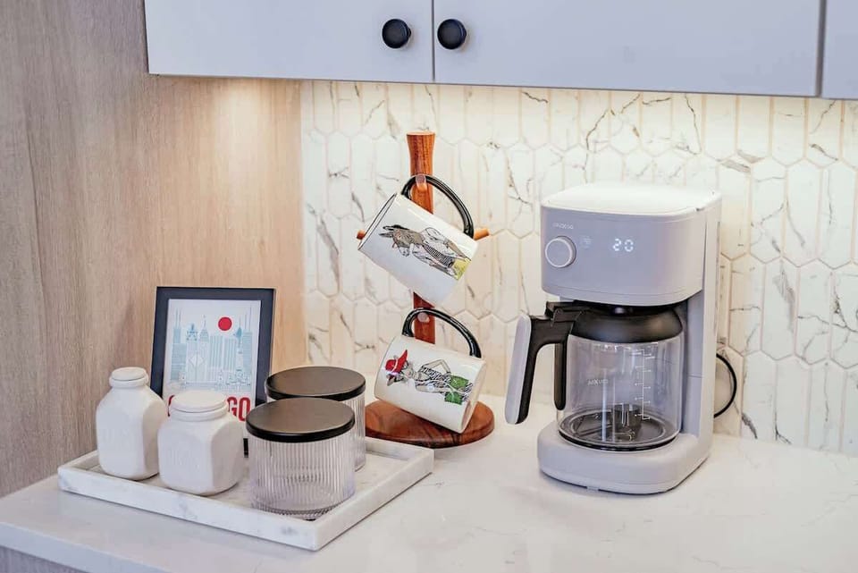 We now have a Keurig coffee maker instead of the pictured drip maker.