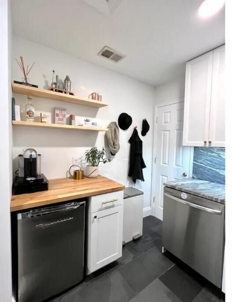 Unit includes a drip coffee pot (coffee provided) and a Nespresso Vertuo machine