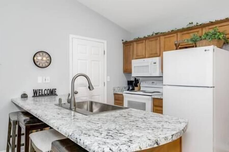 Clean Kitchen Equipped for Preparing Meals