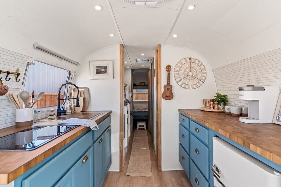 Despite it's size the kitchen is fully equipped with a stove, fridge and sink, and stocked with a selection of Coffees and Teas.