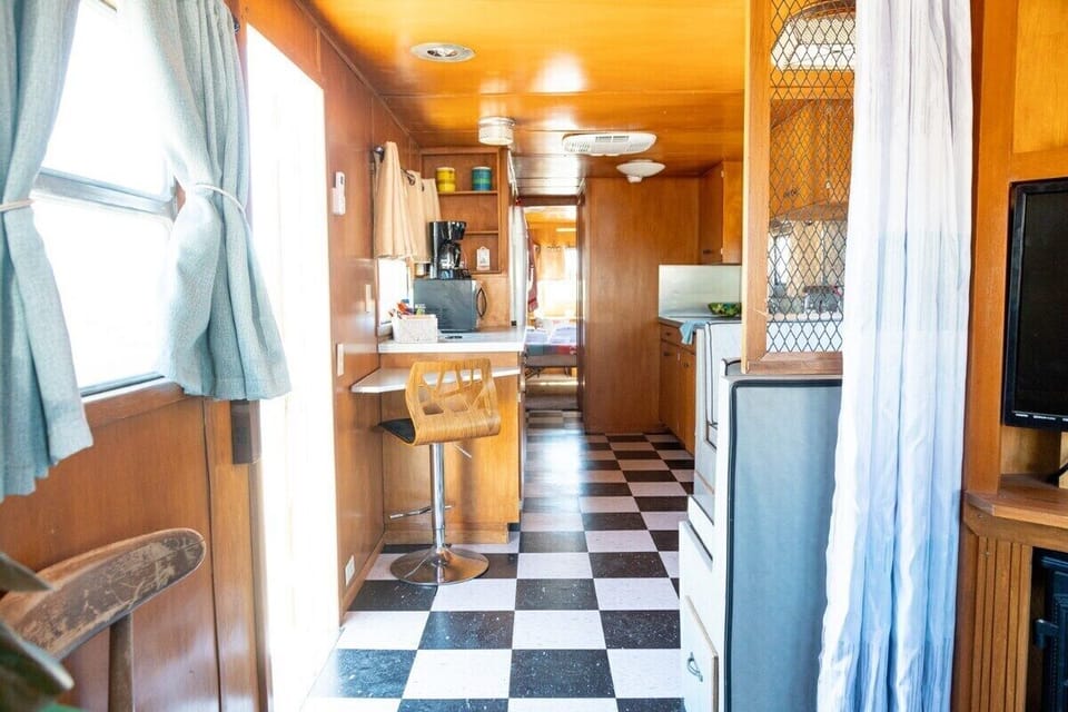 The restored wood blends beautifully with the original paneling, taking you back in time as you walk into the Spartan. 